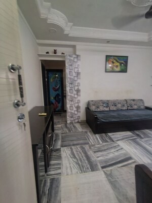 Living Room in 1 BHK Apartment at Godavari CHS Borivali, Borivali East – for Rent
