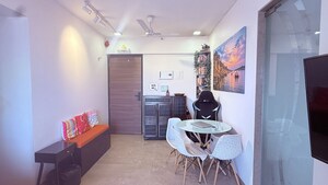 Living Room in 1 BHK Apartment at Laxmi Callista, Goregaon West – for Sale