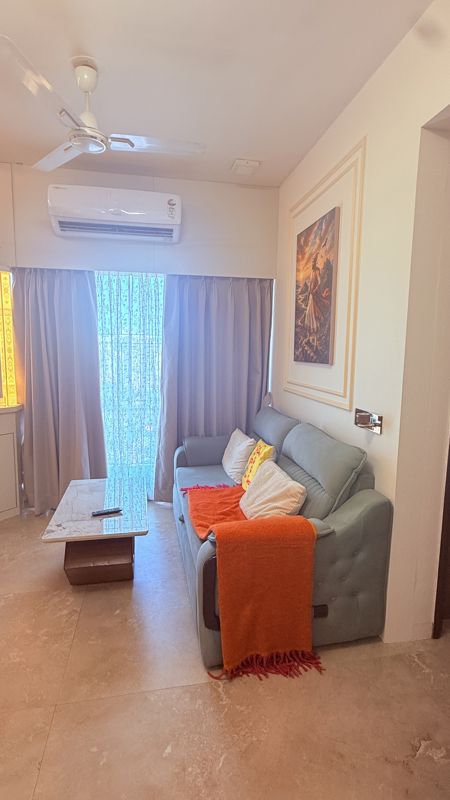Living Room in 1 BHK Apartment at Laxmi Callista, Goregaon West – for Sale