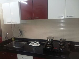 Kitchen in 2 BHK Apartment at Cosmos Jewels, Ghodbunder Road – for Rent