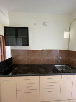 Kitchen in 2 BHK Apartment at Kolte Patil Life Republic 16th Avenue Arezo, Hinjewadi – for Rent