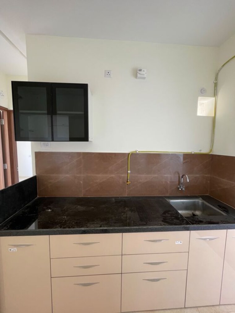 Kitchen, kolte-patil-life-republic-16th-avenue-arezo 2 Bedroom 649 Sq.Ft. Apartment In Hinjewadi Pune 10747976