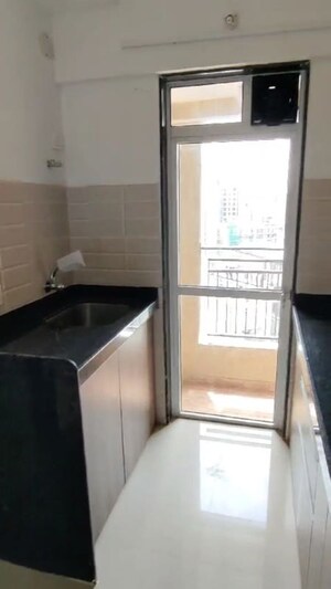Kitchen in 1 BHK Apartment at JP North Alexa, Mira Road – for Rent