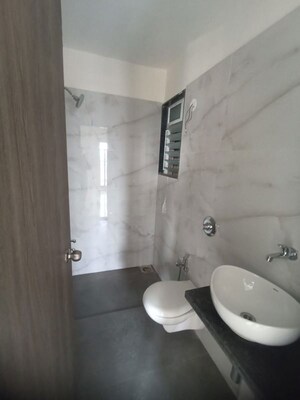 Bathroom in 1 BHK Apartment at Anant Metropolis Insignia Towers, Kasarvadavali – for Rent