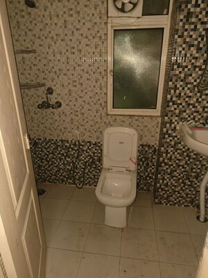 Bathroom in 2 BHK Apartment at Aims Golf City, Sector 75 – for Rent