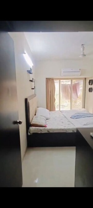 Bedroom in 2 BHK Apartment at Windermere CHS Andheri West, Andheri West – for Rent