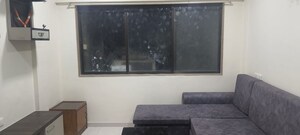 Living Room in 1 BHK Apartment at Rajshree Villa, Bhandup West – for Rent
