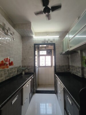 Kitchen in 1 BHK Apartment at Dosti Group Vihar, Samata Nagar – for Rent