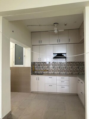 Kitchen in 3 BHK Apartment at Nimbus The Golden Palm, Sector 168 – for Rent