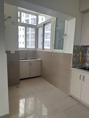 Kitchen in 3 BHK Apartment at Nimbus The Golden Palm, Sector 168 – for Rent