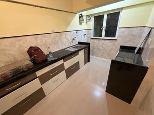 Kitchen in 3 BHK Apartment at Vasant Vihar – for Rent