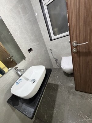 Bathroom in 3 BHK Apartment at Vasant Vihar – for Rent