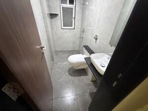 Bathroom in 3 BHK Apartment at Vasant Vihar – for Rent