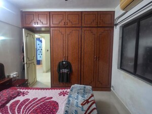 Bedroom in 3 BHK Apartment at Riddhi Gardens CHS, Malad East – for Sale