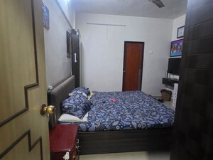 Bedroom in 3 BHK Apartment at Riddhi Gardens CHS, Malad East – for Sale