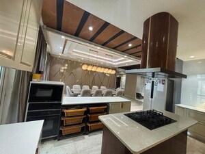 Kitchen in 5 BHK Apartment at Mahagun Moderne, Sector 78 – for Rent