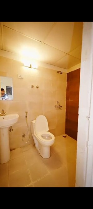 Bathroom in 2.5 BHK Apartment at Windsor Paradise 2, Raj Nagar Extension – for Rent