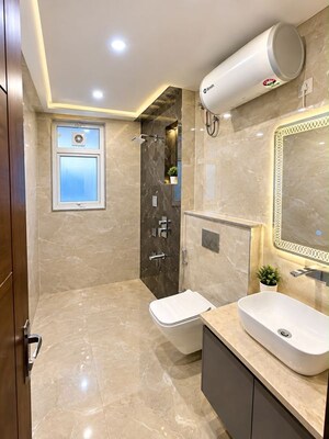 Bathroom in 5 BHK Builder Floor at Sushant Lok I – for Rent