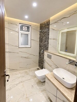 Bathroom in 5 BHK Builder Floor at Sushant Lok I – for Rent