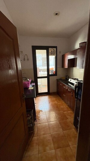 Kitchen in 2.5 BHK Apartment at Aravali Hills, Sector 56 – for Rent