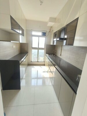 Kitchen in 2 BHK Apartment at Godrej Emerald, Ghodbunder Road – for Rent