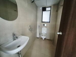Bathroom in 1 BHK Apartment at Runwal My City Phase II Cluster 05, Dombivli East – for Rent