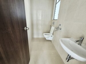 Bathroom in 1.5 BHK Apartment at Runwal My City Phase II Cluster 05, Dombivli East – for Rent