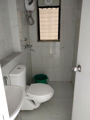 Bathroom in 1.5 BHK Apartment at Runwal Gardens Phase I, Dombivli East – for Rent