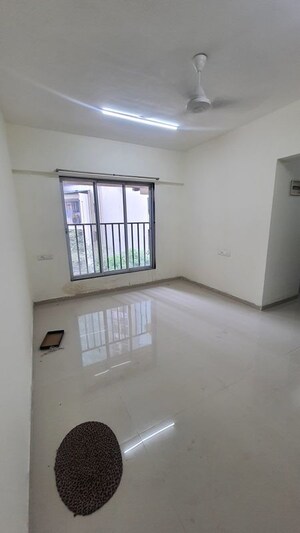 Living Room in 2 BHK Apartment at Om Ashoka Heights, Mulund West – for Rent