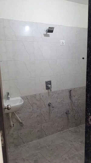 Bathroom in 2 BHK Apartment at Om Ashoka Heights, Mulund West – for Rent