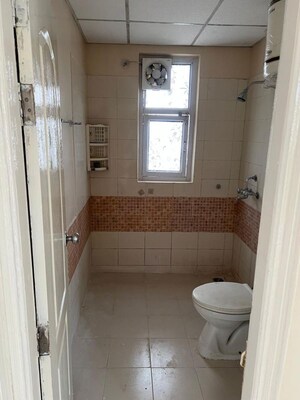 Bathroom in 3 BHK Apartment at Ansals Celebrity Greens, Sushant Golf City – for Rent