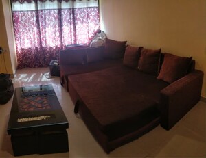 Living Room in 1 BHK Apartment at Royal Palms, Goregaon East – for Rent