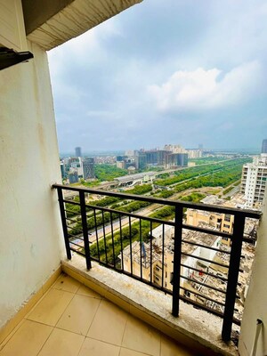 Balcony in 1 RK Apartment at Nimbus The Golden Palm, Sector 168 – for Rent