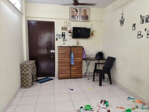 Living Room in 1 BHK Apartment at Shubham Pearl, Nerul Sector 21 – for Rent