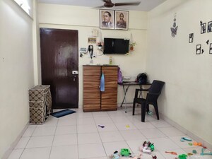 Living Room in 1 BHK Apartment at Shubham Pearl, Nerul Sector 21 – for Rent
