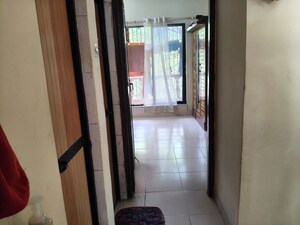 Building Lobby in 1 BHK Apartment at Shubham Pearl, Nerul Sector 21 – for Rent