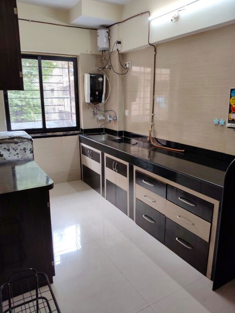 Kitchen, raheja-gardens 2 Bedroom 1100 Sq.Ft. Apartment In Wanwadi Pune 10749025