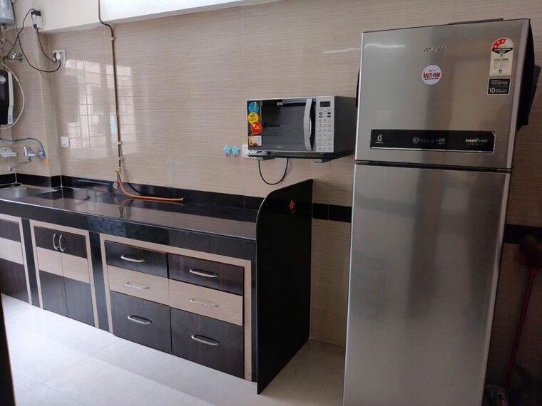 Kitchen, raheja-gardens 2 Bedroom 1100 Sq.Ft. Apartment In Wanwadi Pune 10749025