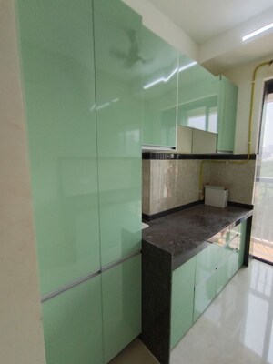 Kitchen in 2 BHK Apartment at Dhamji Shamji Mahavir Spring Tulip Phase 1, Pokhran Road No Two – for Rent