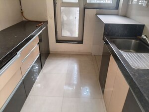 Kitchen in 2 BHK Apartment at Classics Residency Seawoods, Seawoods – for Rent