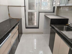 Kitchen in 2 BHK Apartment at Classics Residency Seawoods, Seawoods – for Rent