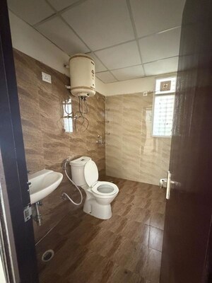 Bathroom in 4 BHK Apartment at Crystal Apartments Noida, Sector 73 – for Rent