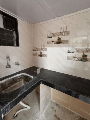Kitchen in 1 RK Apartment at Gokuldham Complex, Goregaon East – for Rent