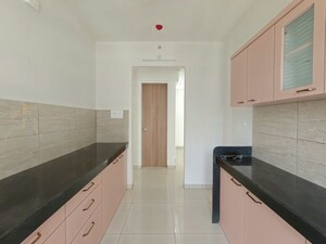 Kitchen in 3 BHK Apartment at Godrej Emerald, Ghodbunder Road – for Rent