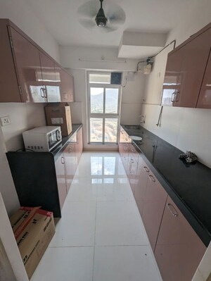 Kitchen in 3 BHK Apartment at Godrej Emerald, Ghodbunder Road – for Rent
