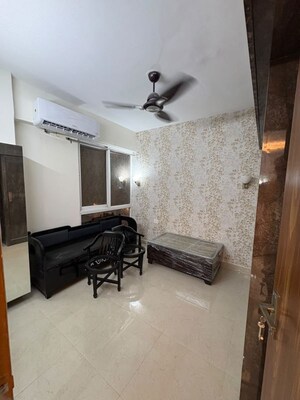 Living Room in 2 BHK Apartment at Signature The Millennia 3, Sector 37d – for Rent