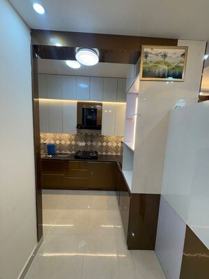 Kitchen in 2 BHK Apartment at Signature The Millennia 3, Sector 37d – for Rent