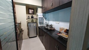 Kitchen in 1 BHK Apartment at Maple Wood, Kalyani Nagar – for Rent