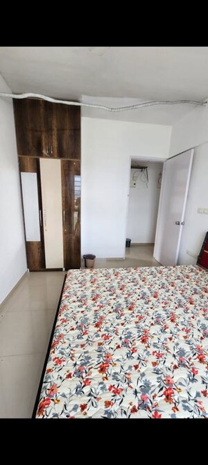 Bedroom in 3 BHK Apartment at Sheth Vasant Lawns, Laxmi Nagar – for Rent