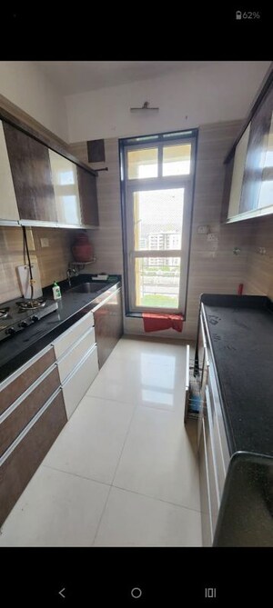 Kitchen in 3 BHK Apartment at Sheth Vasant Lawns, Laxmi Nagar – for Rent